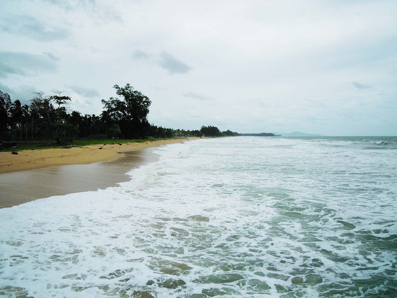 Natai Beach shoreline on the Andaman coast